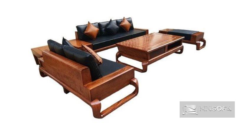 Đệm ghế màu xám đen tuyền chất liệu da trên ghế sofa chân xoắn làm nổi bật vẻ đẹp tinh tế và thanh lịch trong thiết kế nội thất
