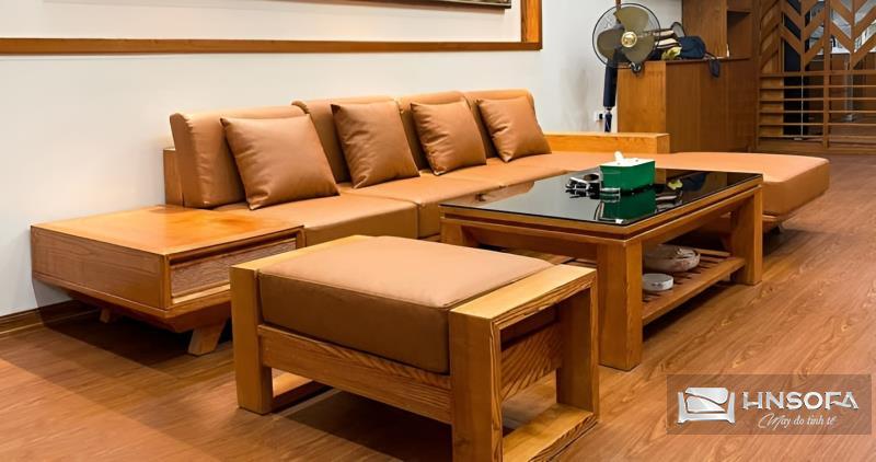 Mẫu thiết kế sofa tay gỗ làm bằng da có màu nâu ấm cúng