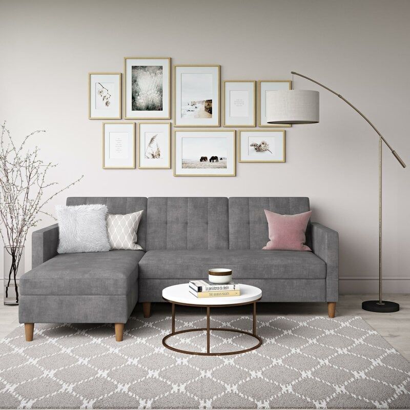 Kết hợp với sofa góc chữ L với bàn tròn giúp tối ưu căn phòng