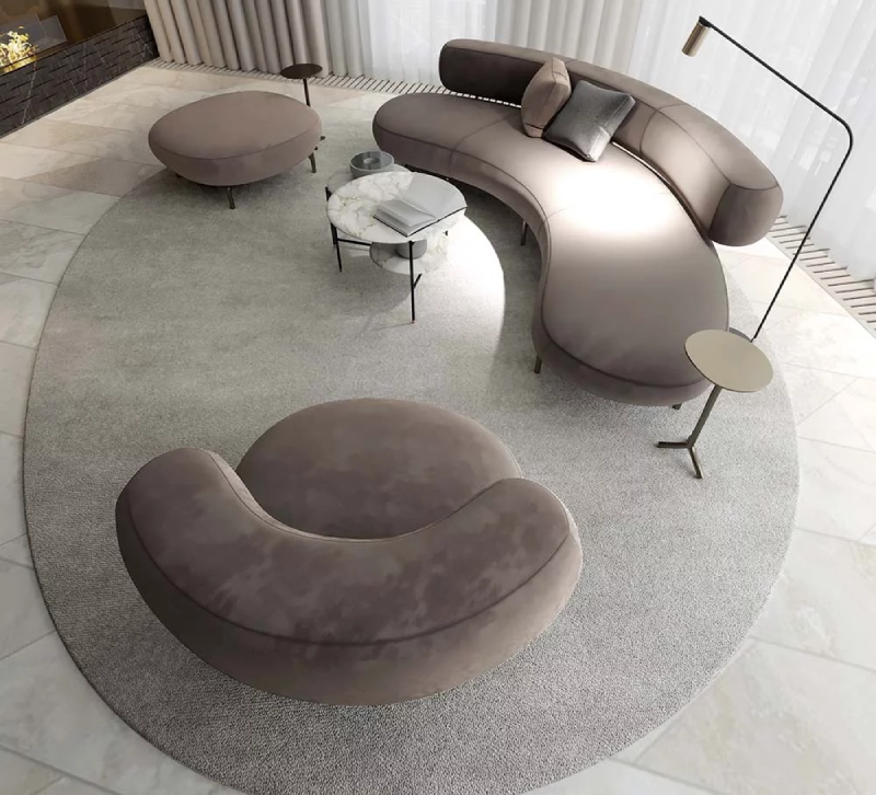 Sofa vòng cung đơn dời với những đường cong mềm mại và uốn lượn tinh tế, tạo nên một không gian sống cá tính và đẳng cấp.